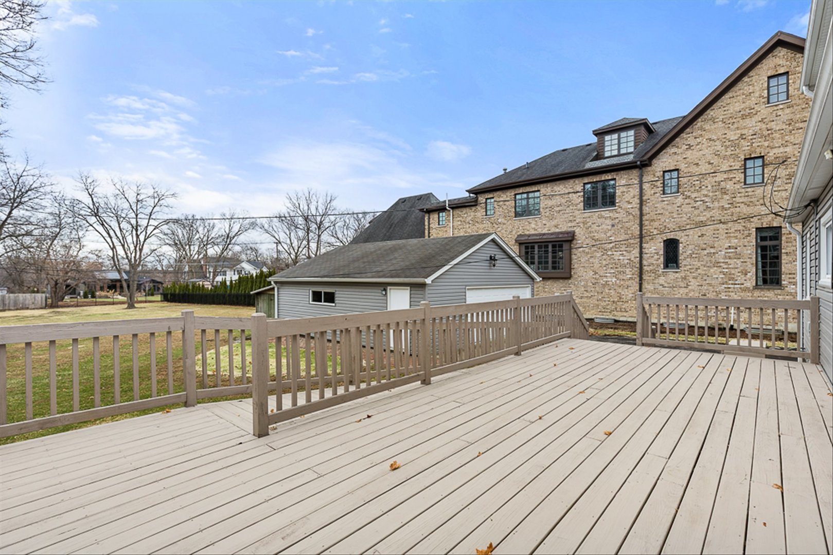5631 South Oak Street Hinsdale, IL 60521 - Photo 31 of 38 a view of a wooden deck with a yard