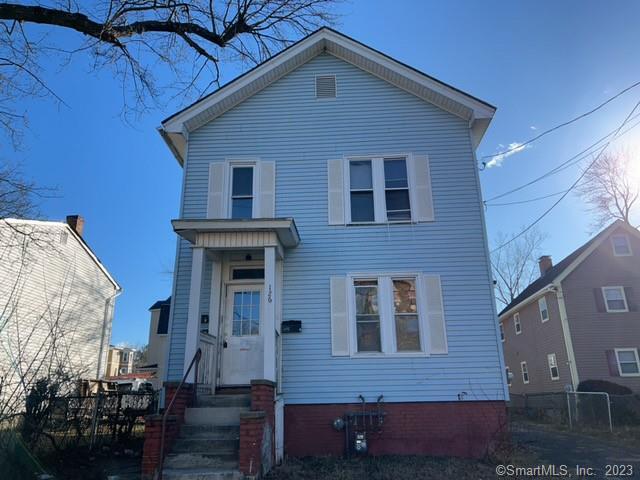 126 Martin Street Hartford, CT 06120 - Photo 1 of 1 a front view of a house with a yard