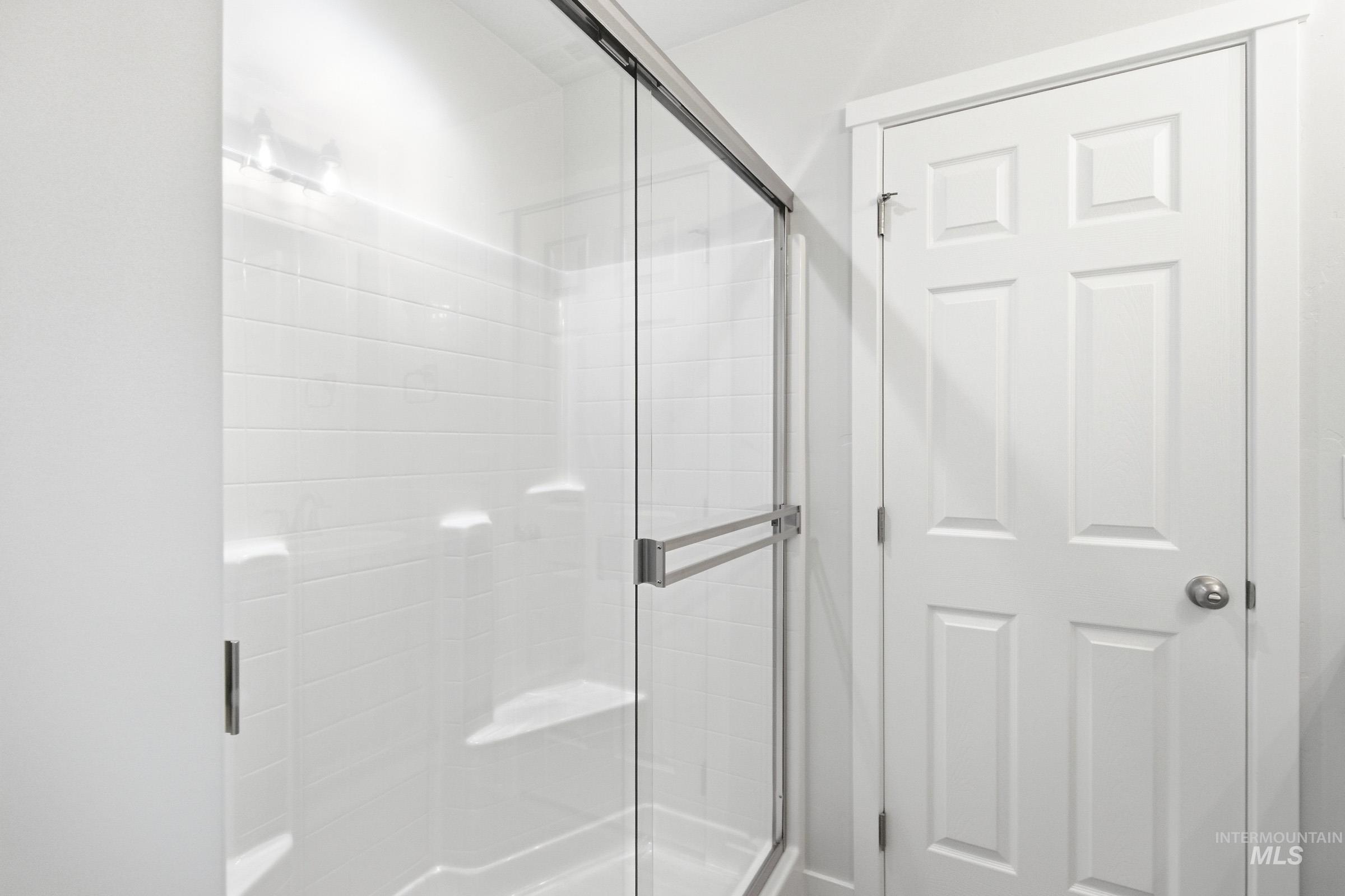 13735 Inman Court Caldwell, ID 83607 - Photo 18 of 20 Bathroom featuring a stall shower