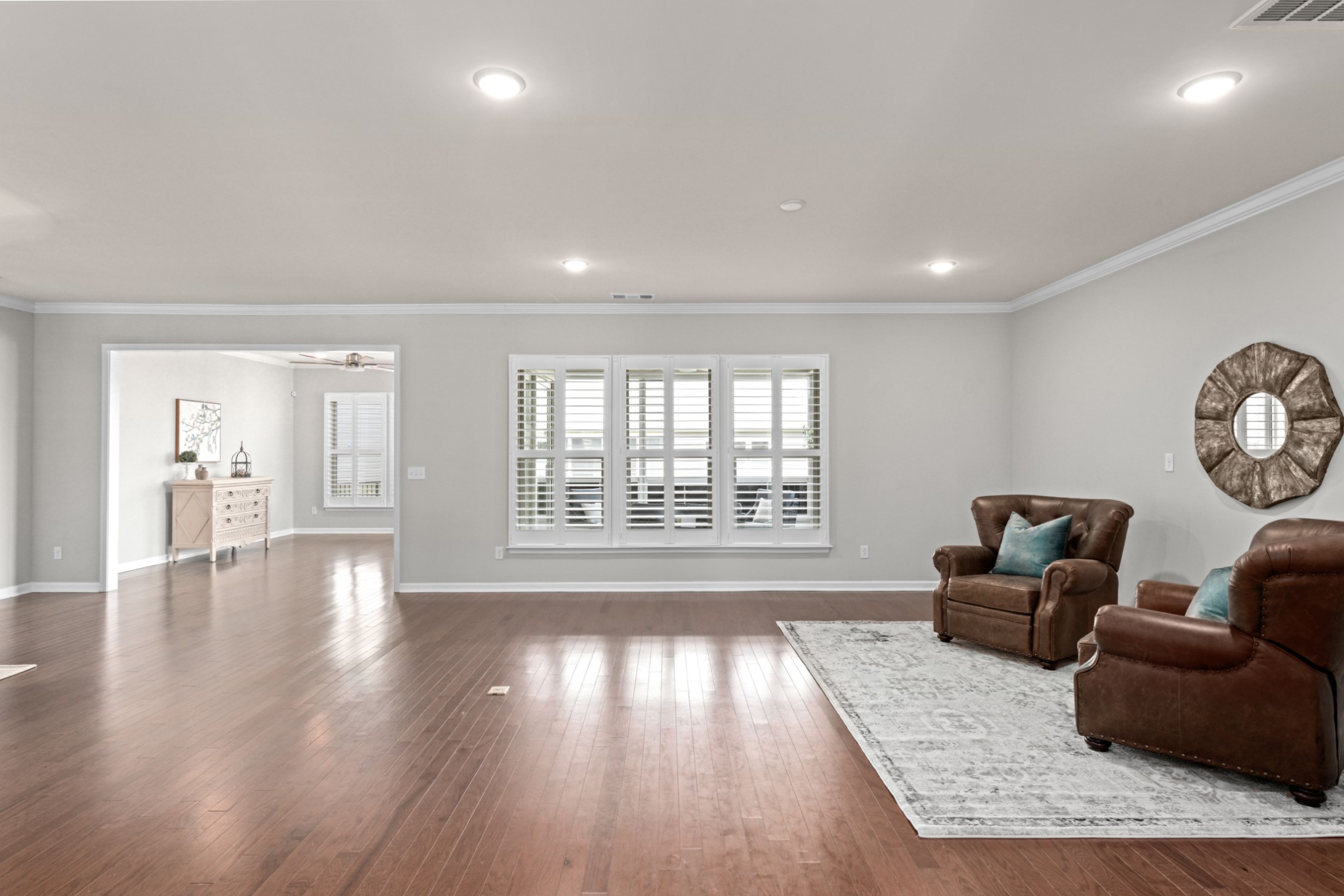 1009 Coffee Ridge Spring Hill, TN 37174 - Photo 16 of 53 a living room with furniture and wooden floor