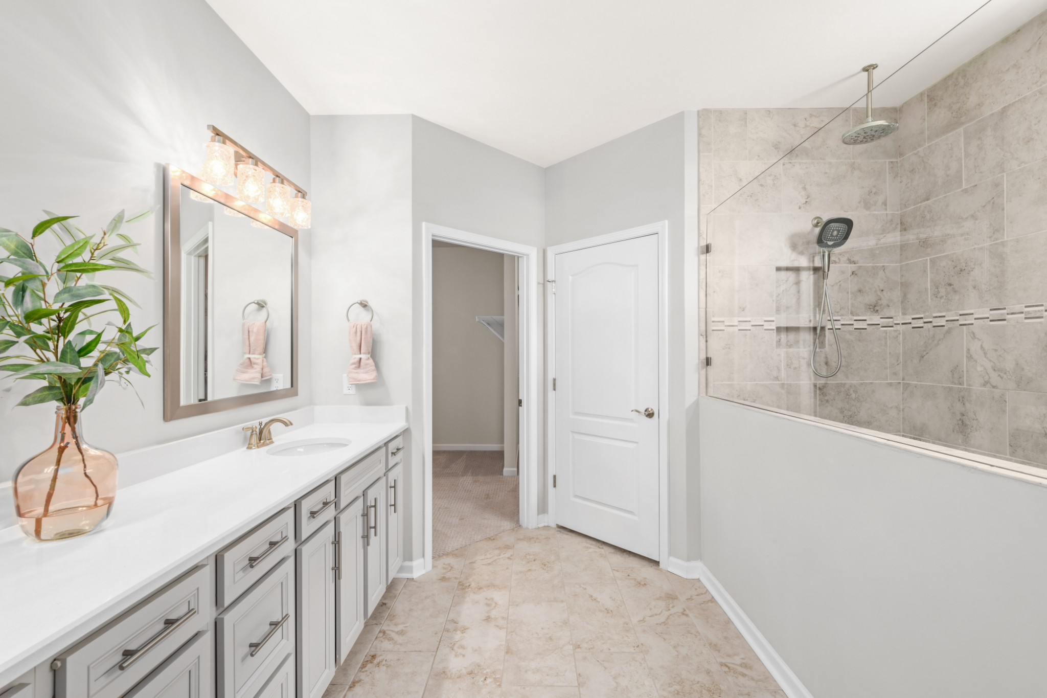 1009 Coffee Ridge Spring Hill, TN 37174 - Photo 19 of 53 a bathroom with a granite countertop sink and a mirror