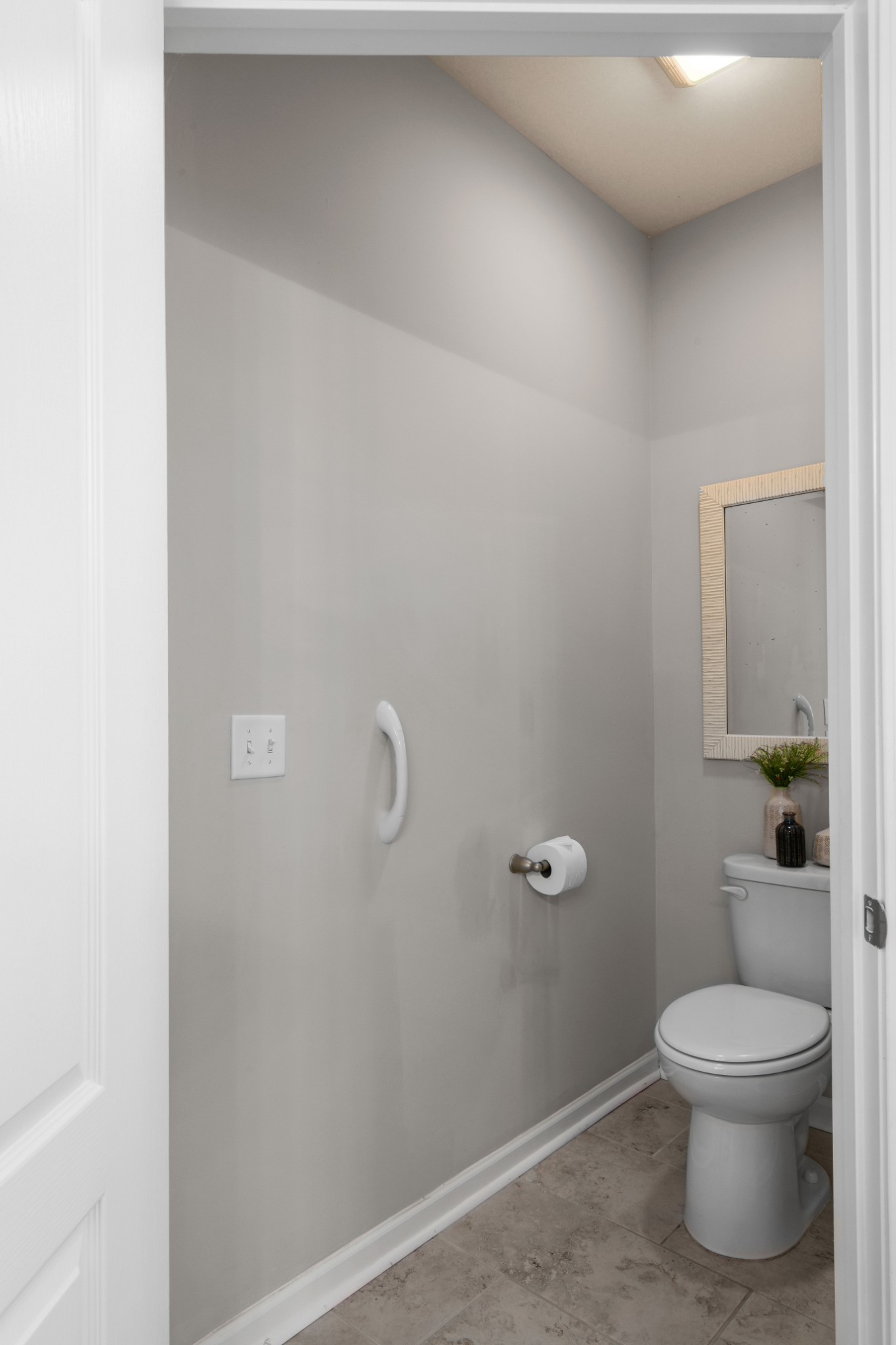 1009 Coffee Ridge Spring Hill, TN 37174 - Photo 24 of 53 a white toilet sitting next to a bathroom sink
