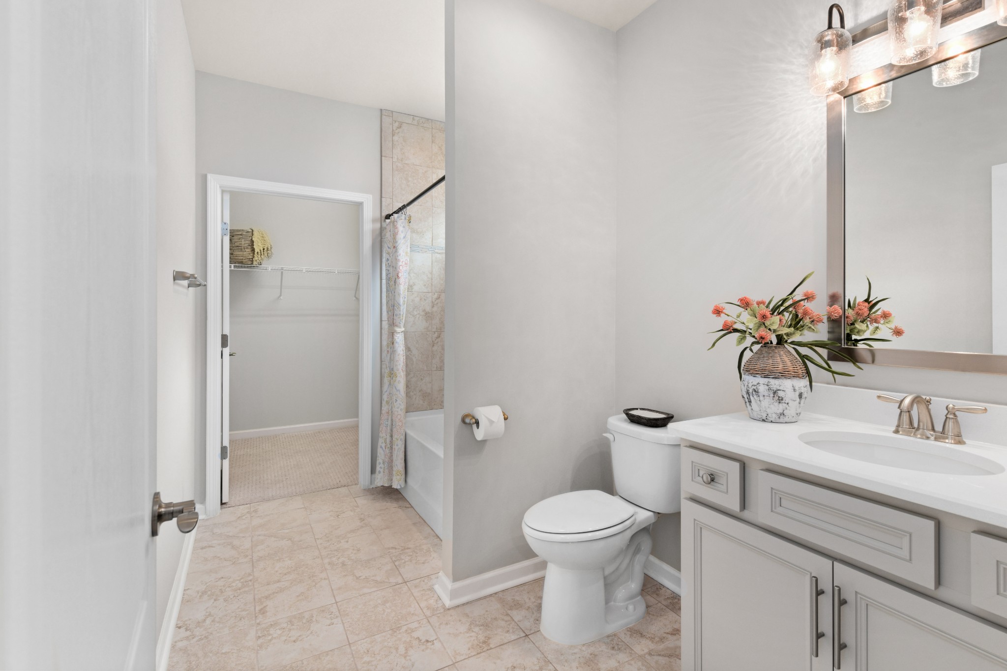 1009 Coffee Ridge Spring Hill, TN 37174 - Photo 29 of 53 a bathroom with a sink toilet and shower