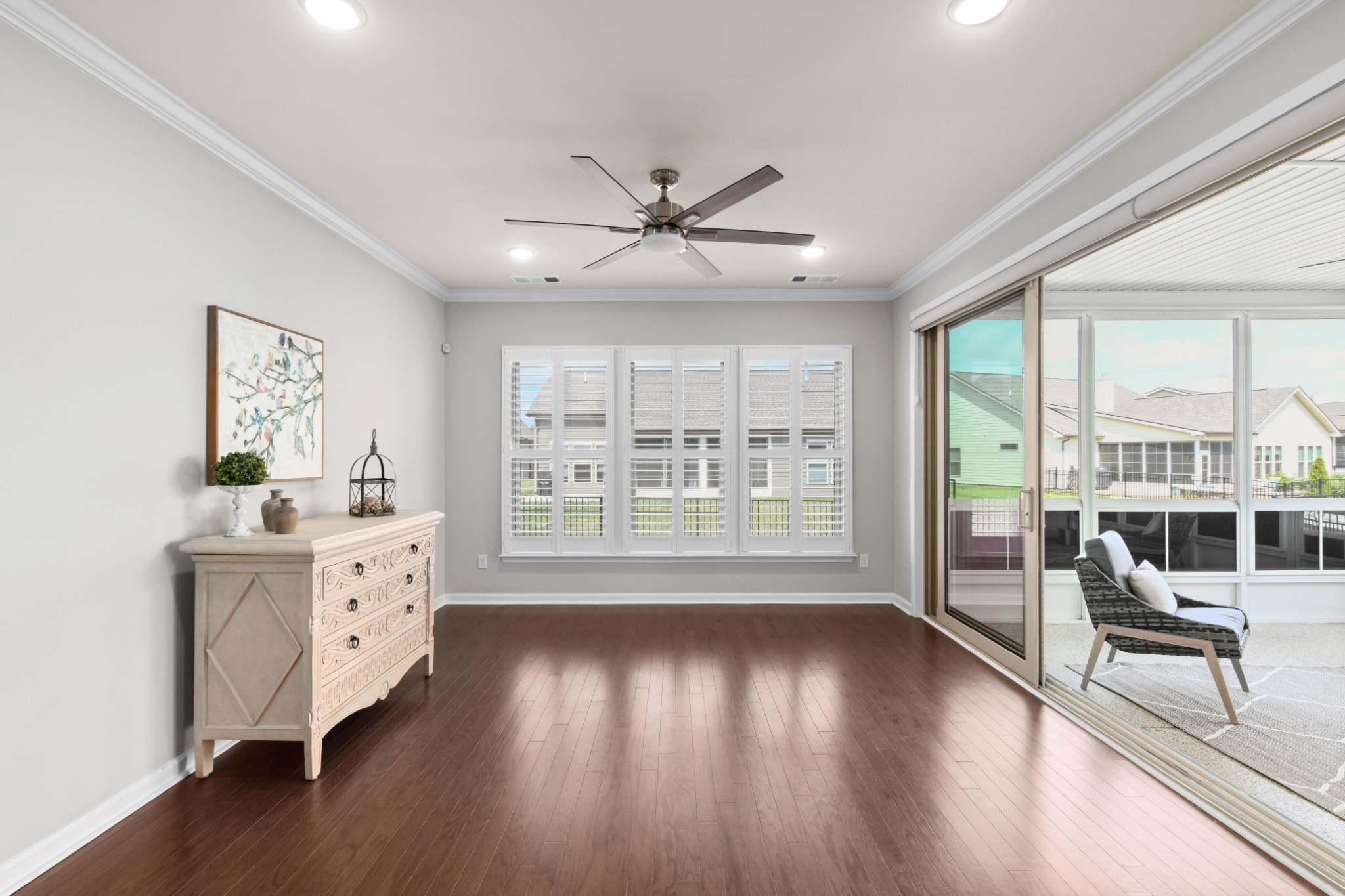 1009 Coffee Ridge Spring Hill, TN 37174 - Photo 33 of 53 a spacious bedroom with a balcony a bed and a large window with wooden floor