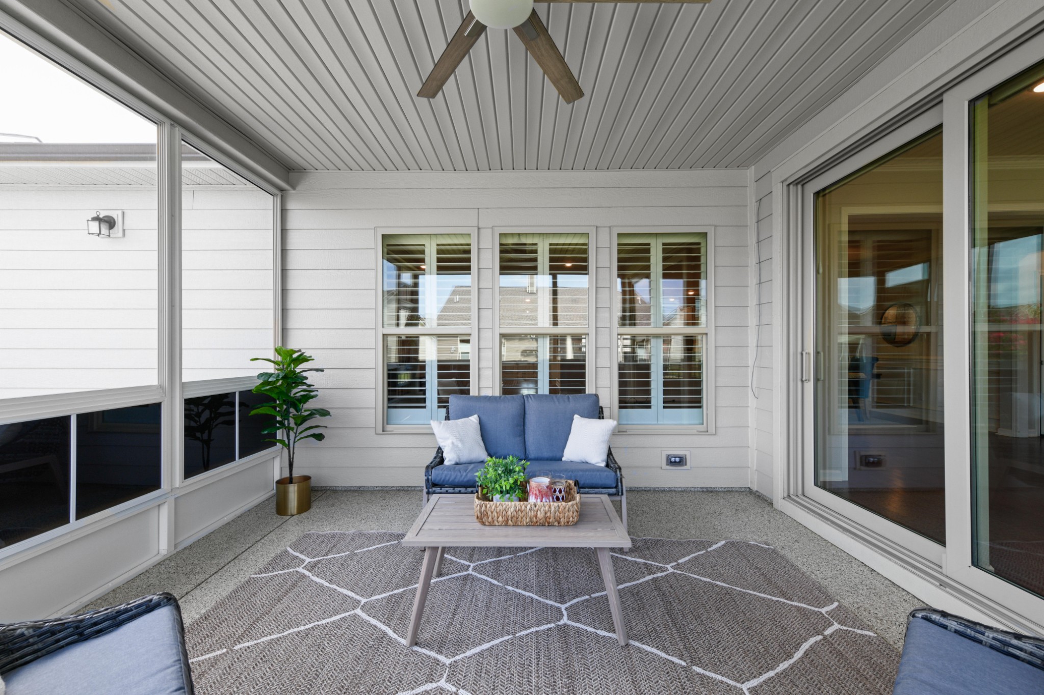 1009 Coffee Ridge Spring Hill, TN 37174 - Photo 35 of 53 a view of a patio with table and chairs and potted plants
