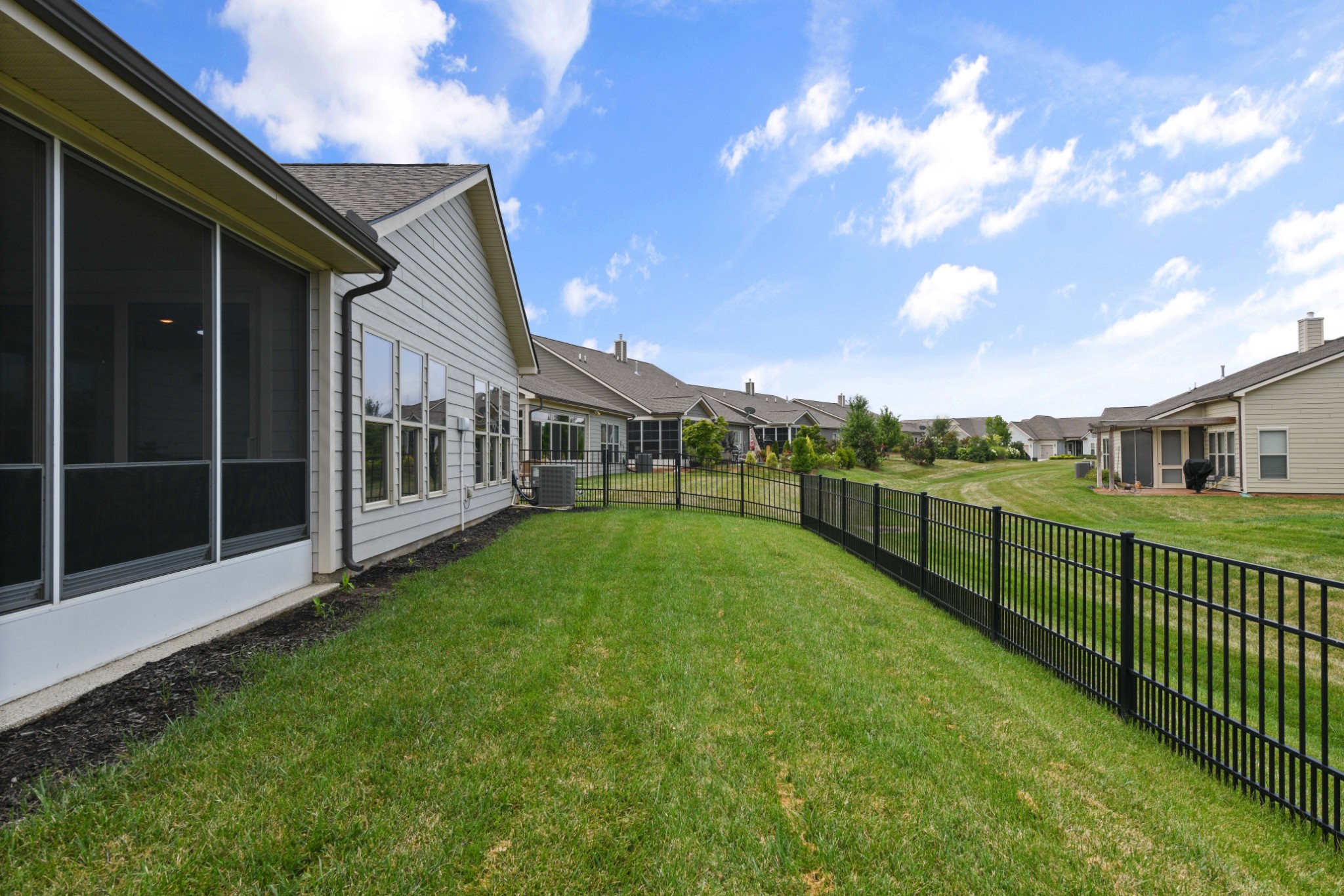1009 Coffee Ridge Spring Hill, TN 37174 - Photo 40 of 53 a view of a house with backyard and porch
