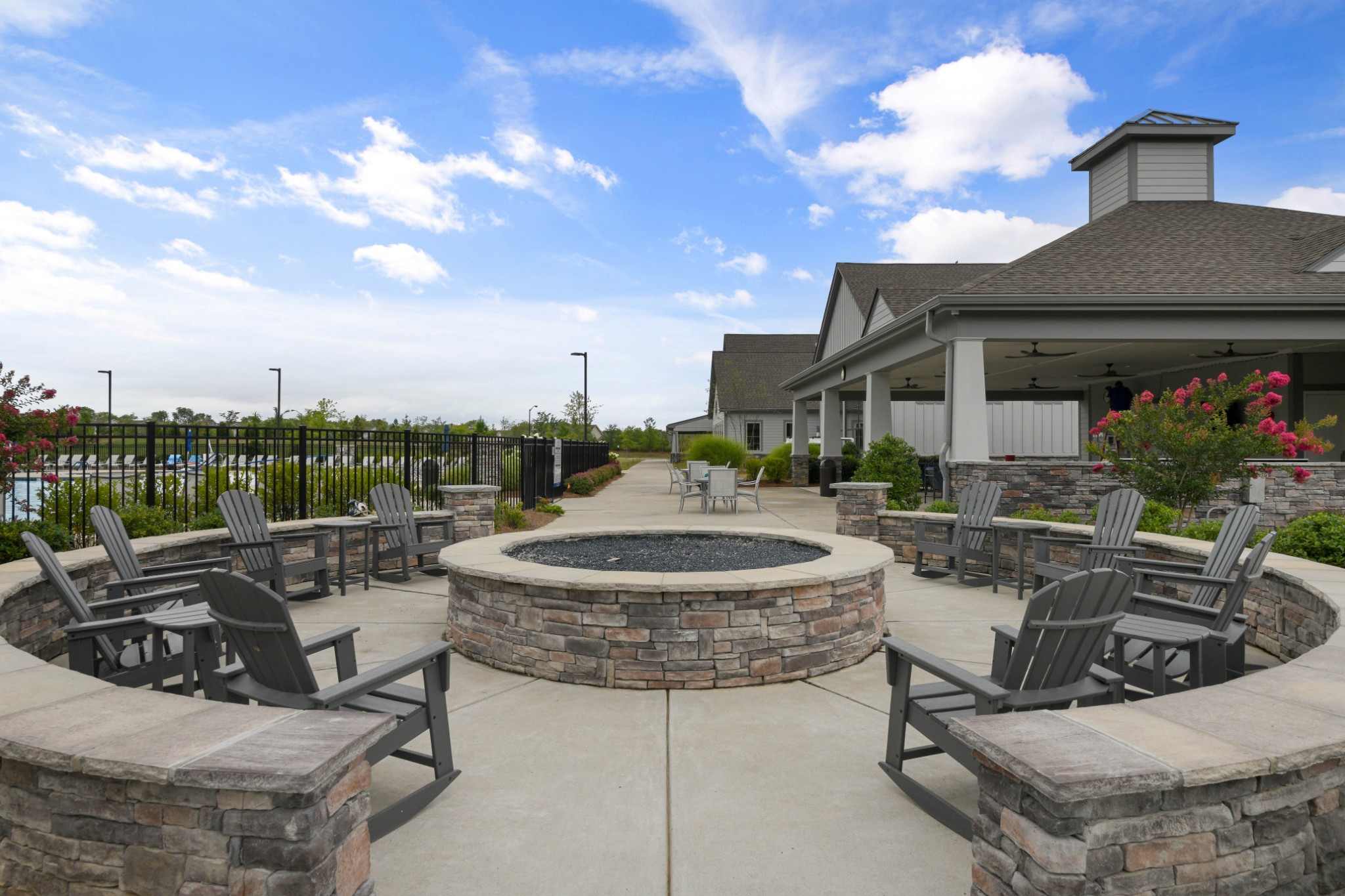 1009 Coffee Ridge Spring Hill, TN 37174 - Photo 47 of 53 a view of a patio with couches and a table and chairs with potted plants