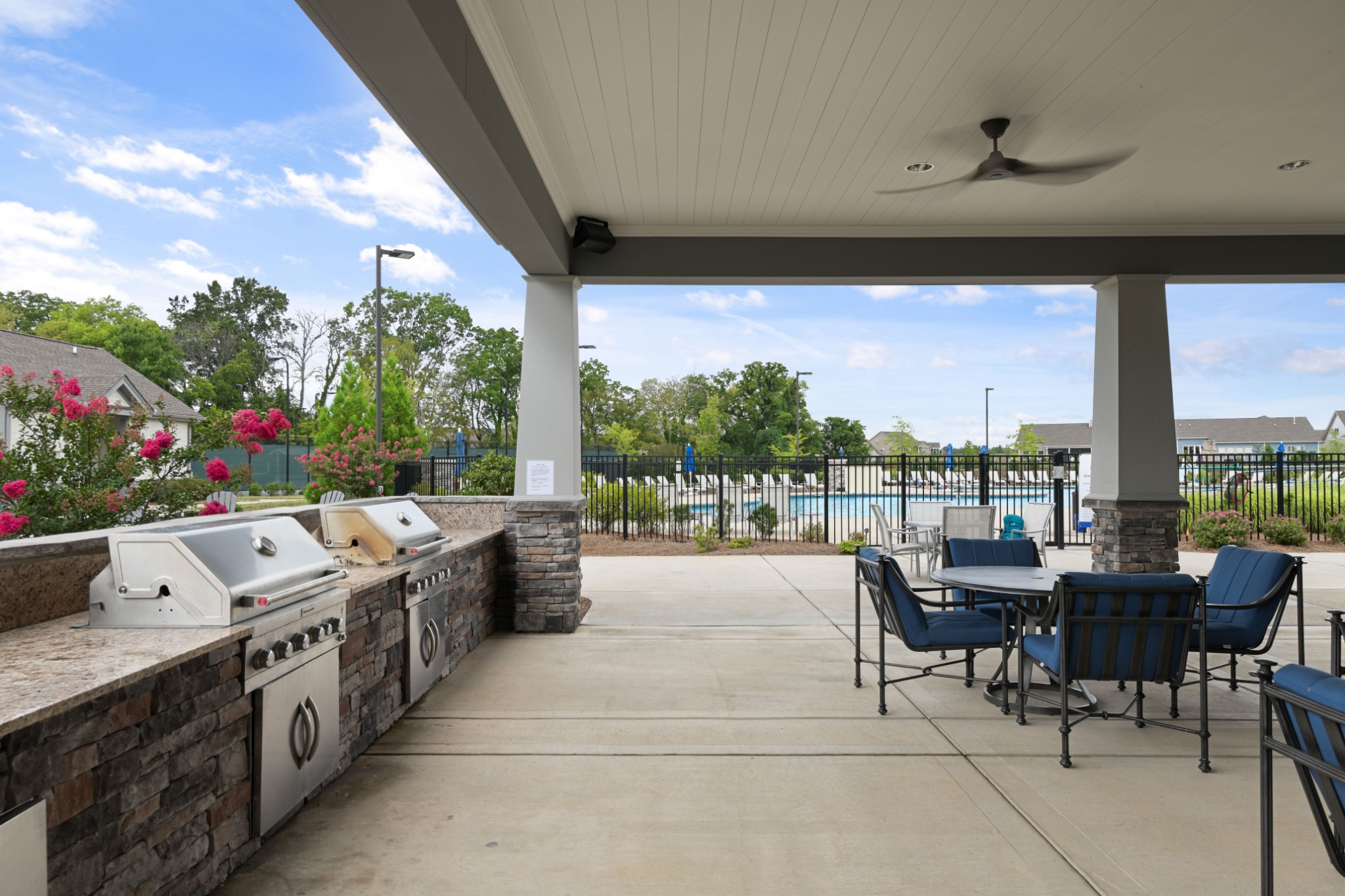 1009 Coffee Ridge Spring Hill, TN 37174 - Photo 48 of 53 a open kitchen with stainless steel appliances granite countertop a stove and a refrigerator