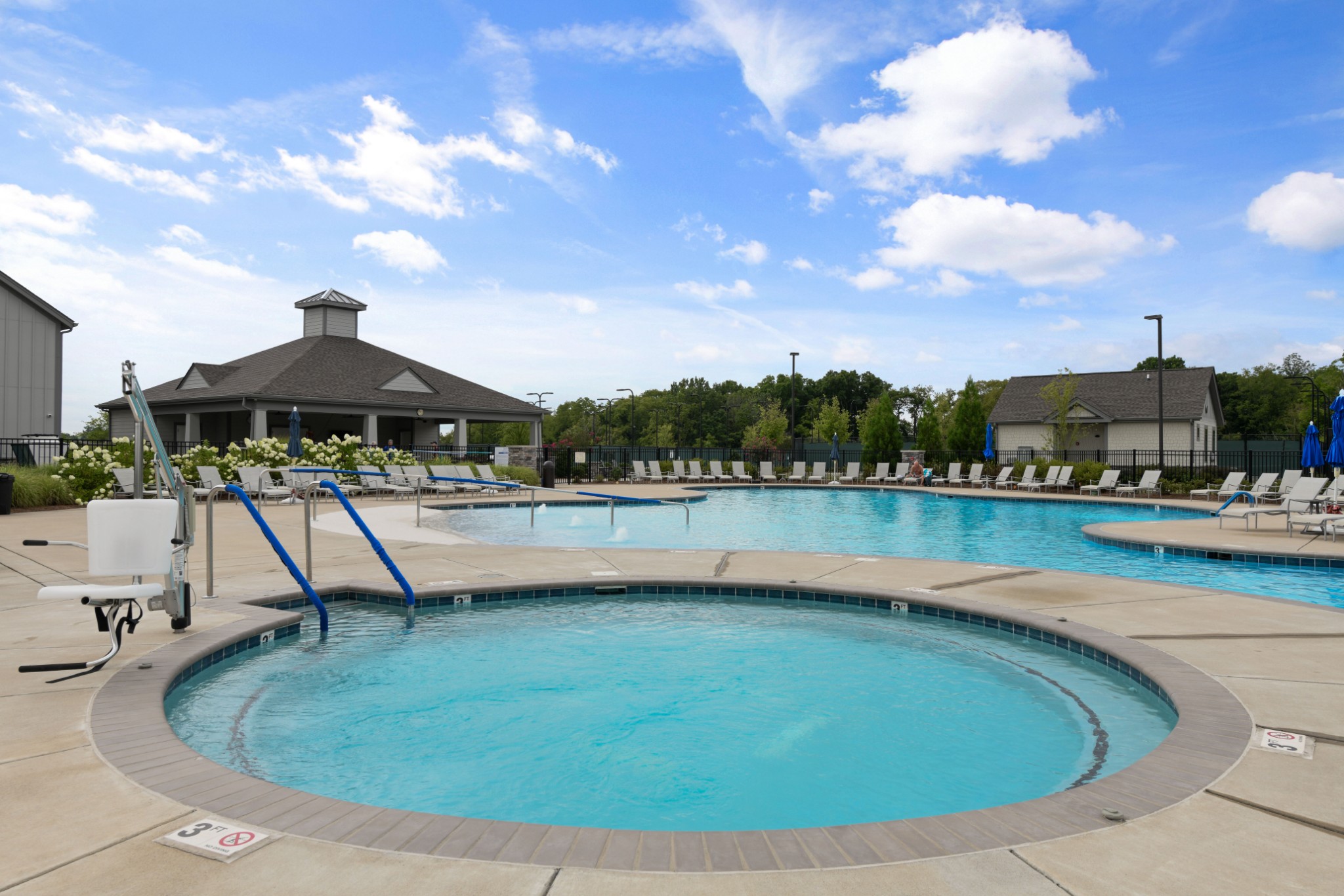 1009 Coffee Ridge Spring Hill, TN 37174 - Photo 50 of 53 a view of a lake with a swimming pool
