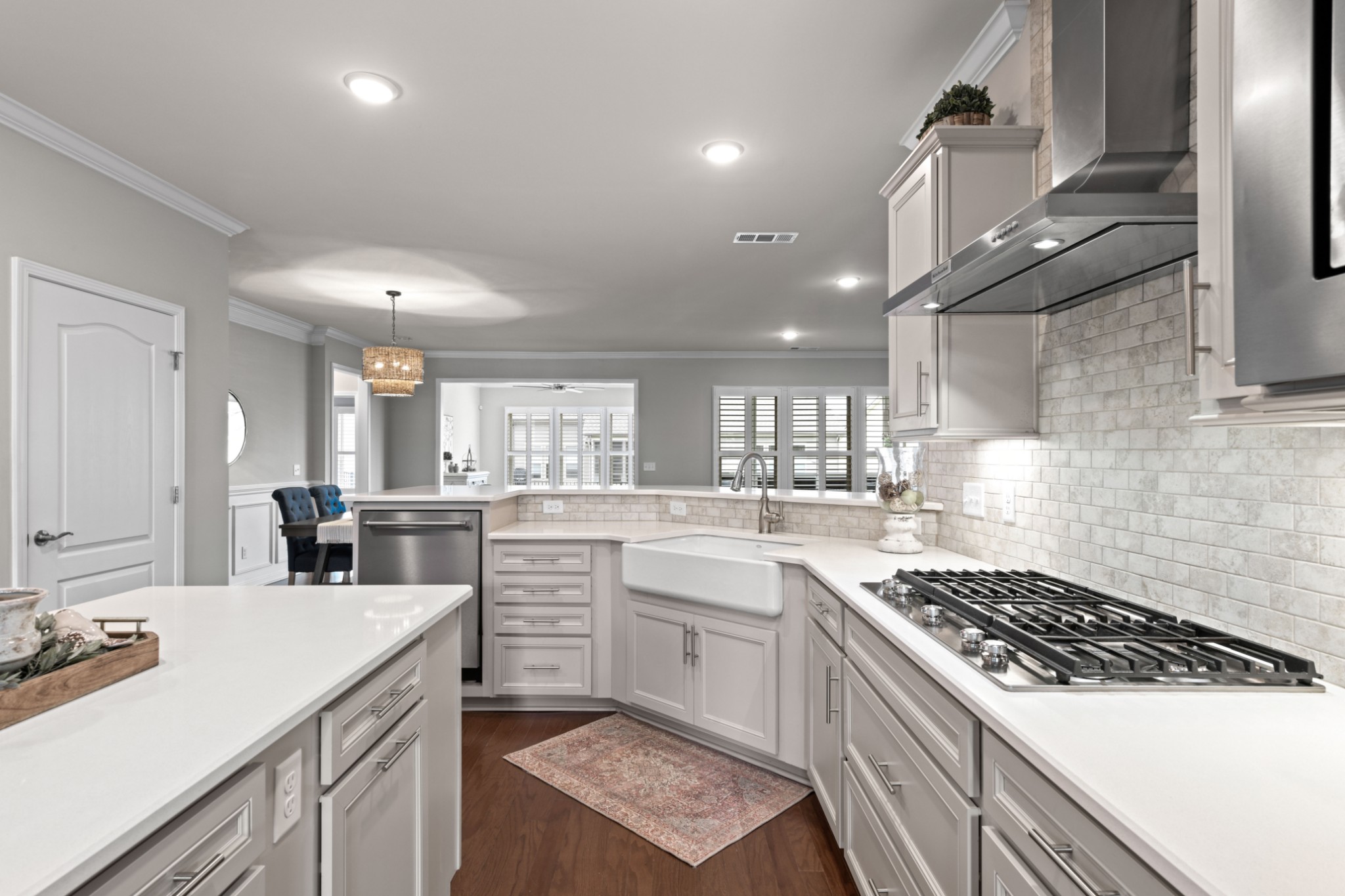 1009 Coffee Ridge Spring Hill, TN 37174 - Photo 8 of 53 a kitchen with a sink stove and cabinets
