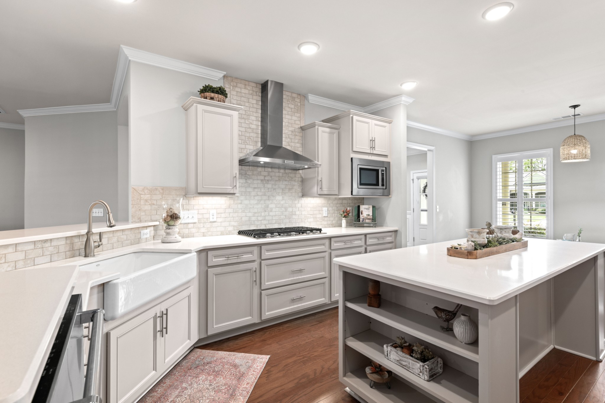 1009 Coffee Ridge Spring Hill, TN 37174 - Photo 9 of 53 a kitchen with a sink stove and cabinets
