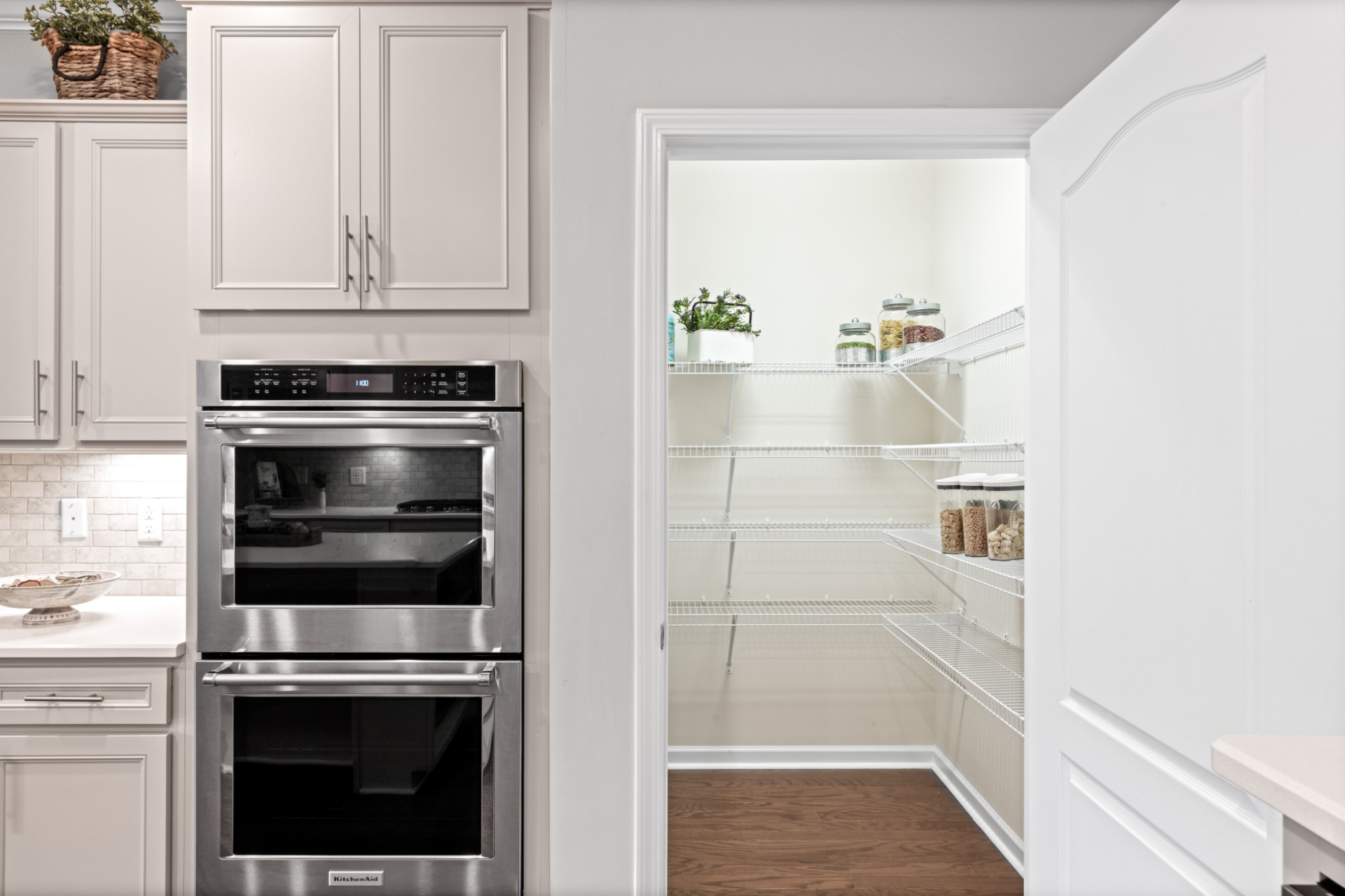 1009 Coffee Ridge Spring Hill, TN 37174 - Photo 10 of 53 a kitchen with granite countertop white cabinets and stainless steel appliances