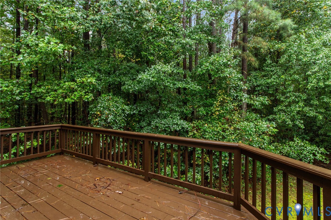10710 Courthouse Road Dinwiddie, VA 23841 - Photo 16 of 48 a view of balcony with wooden floor