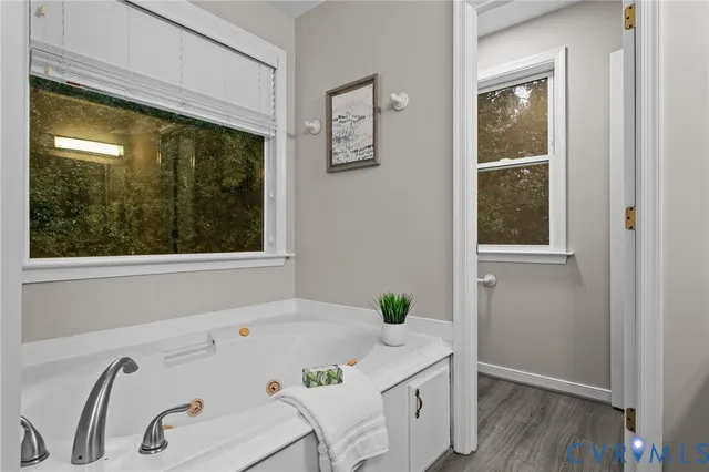 a bathroom with a sink double vanity and a mirror