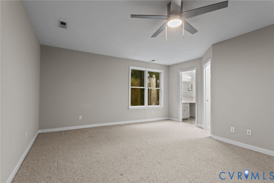 10710 Courthouse Road Dinwiddie, VA 23841 - Photo 39 of 48 a view of an empty room with a window