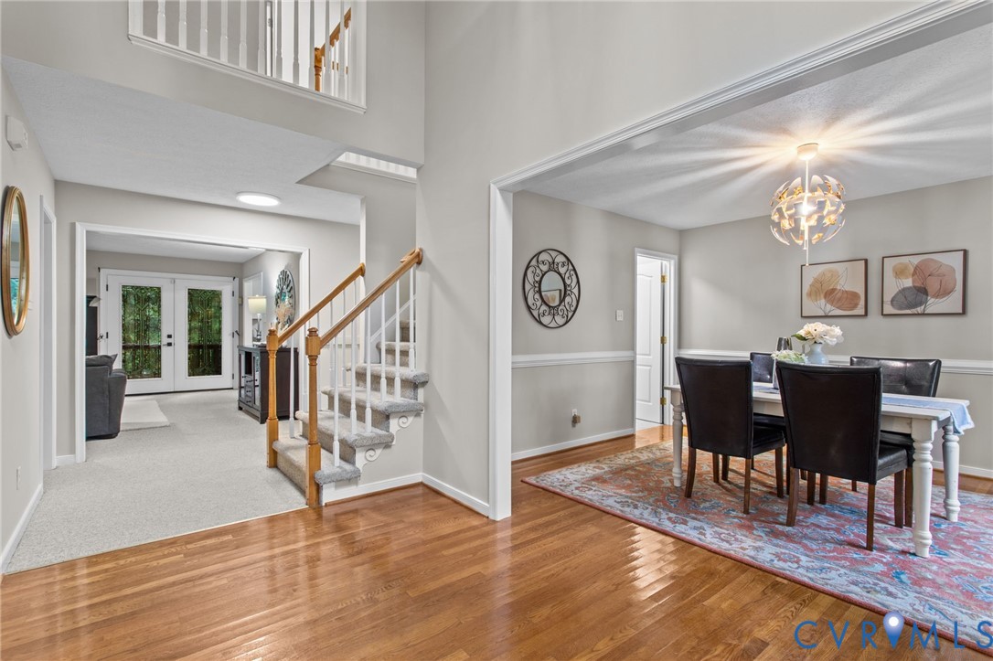 10710 Courthouse Road Dinwiddie, VA 23841 - Photo 4 of 48 a view of a livingroom with furniture and hardwood floor