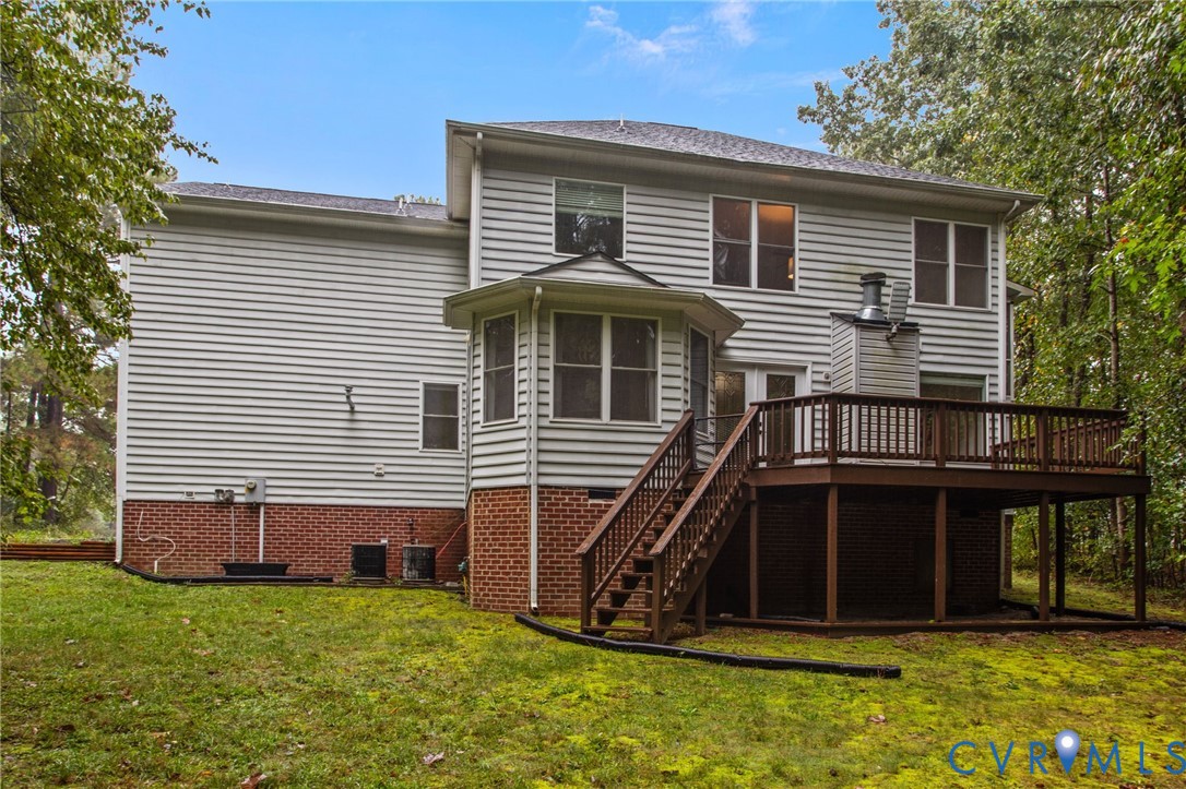 10710 Courthouse Road Dinwiddie, VA 23841 - Photo 45 of 48 a front view of a house with a yard