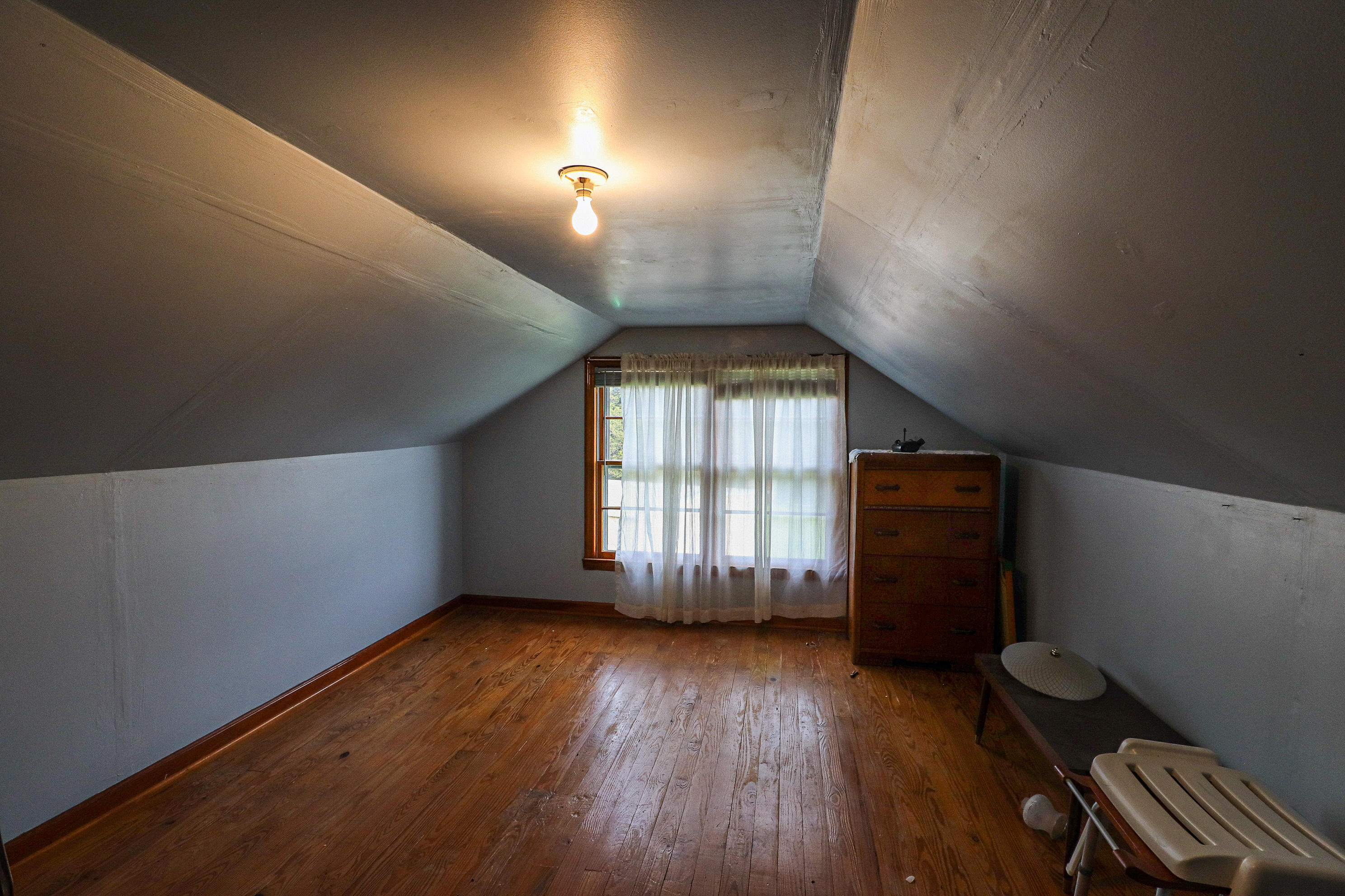 1040 Eanes Road Northeast Check, VA 24072 - Photo 16 of 17 an empty room with wooden floor and windows