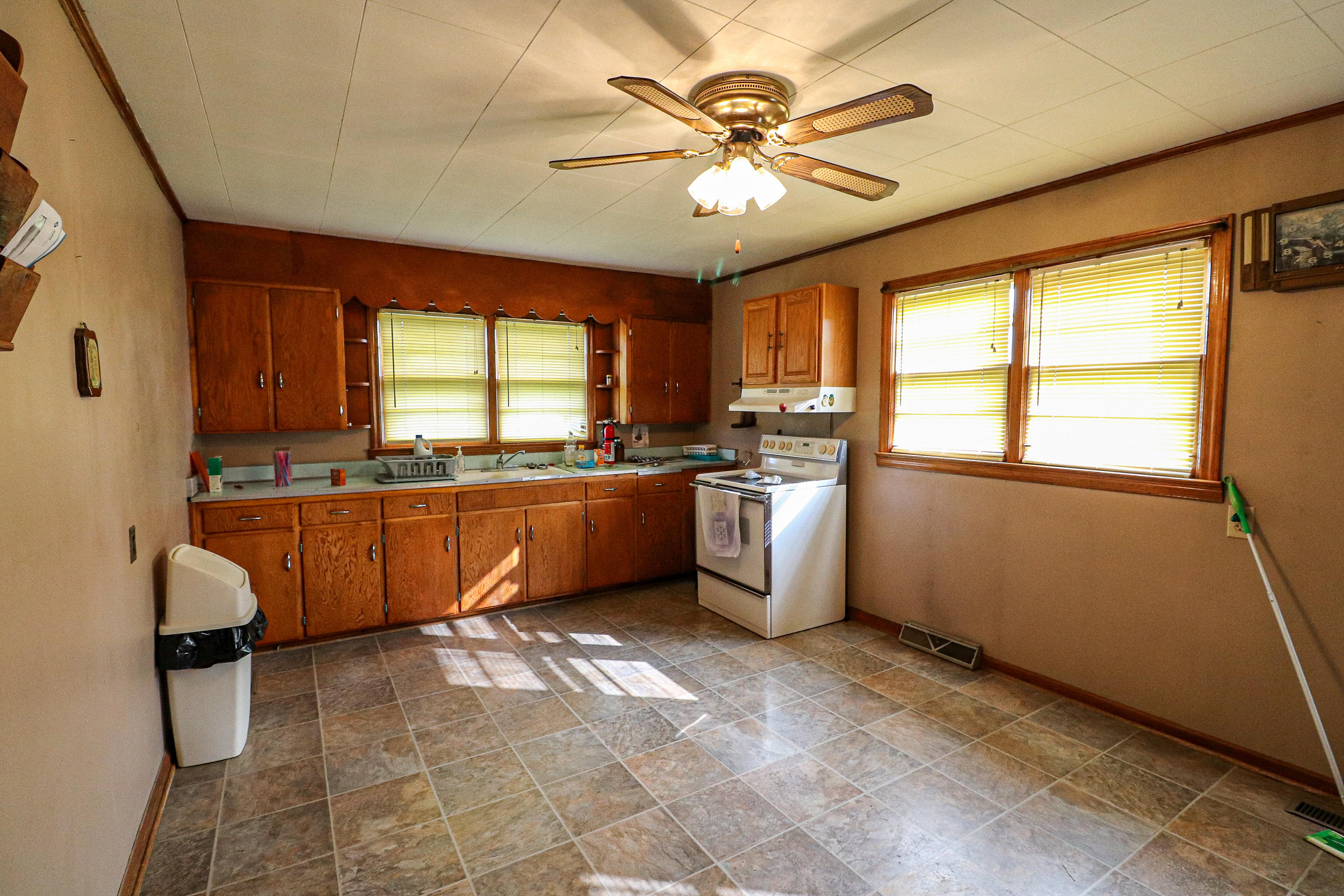 1040 Eanes Road Northeast Check, VA 24072 - Photo 10 of 17 a kitchen with a sink a window and stainless steel appliances