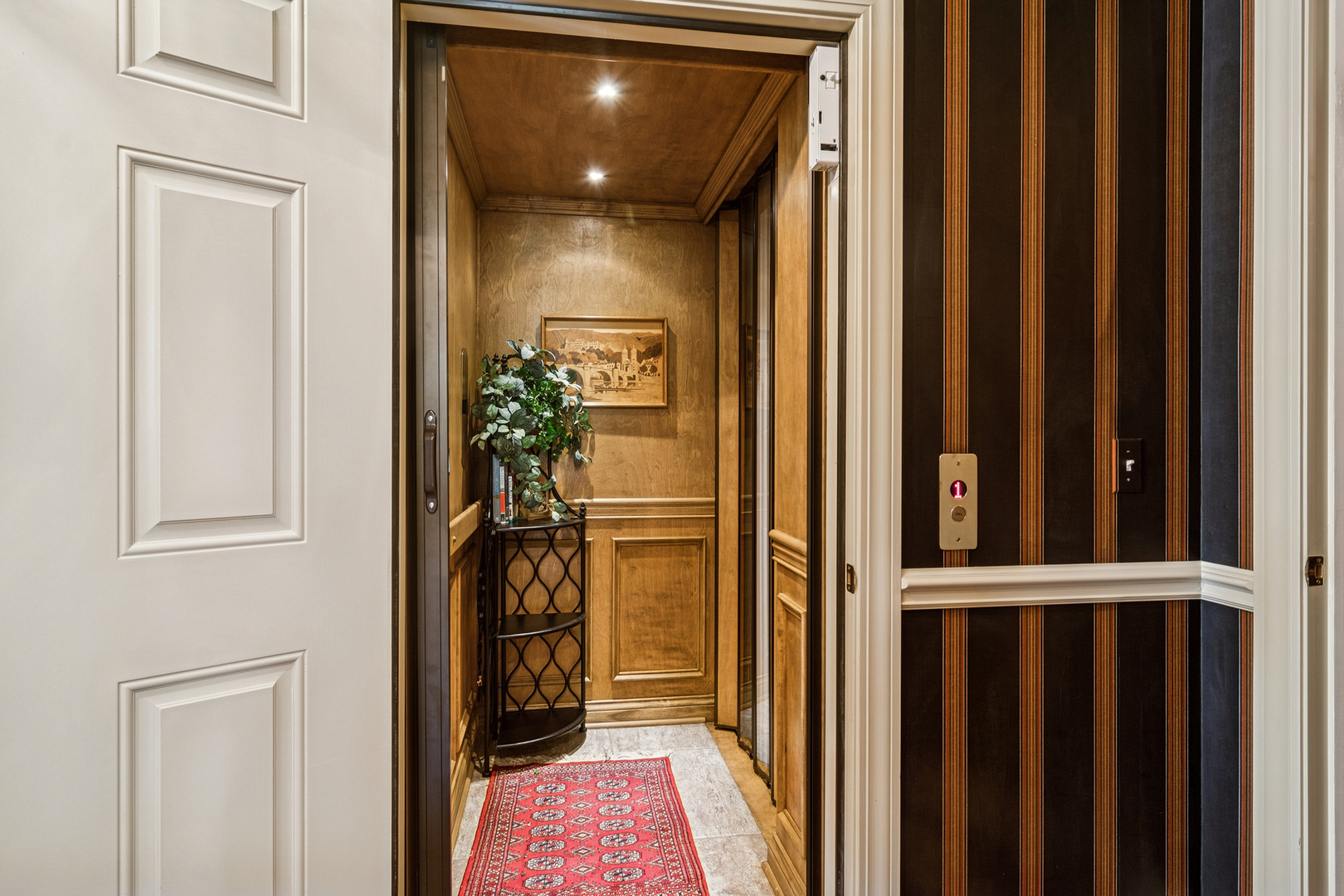 1520 MacAlpin Circle Inverness, IL 60010 - Photo 25 of 58 a view of a hallway with wooden floor and a door