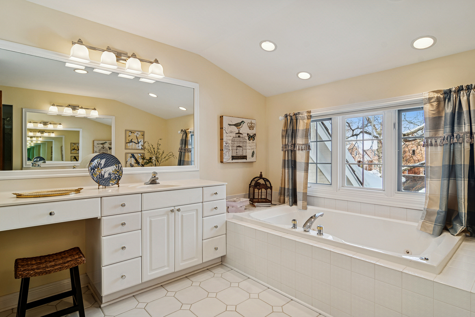 1520 MacAlpin Circle Inverness, IL 60010 - Photo 31 of 58 a spacious bathroom with a large tub sink and window