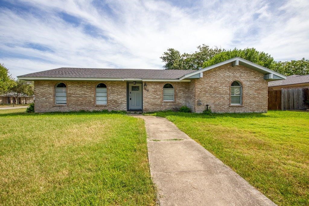 1810 Marlin Street Portland, TX 78374 - Photo 1 of 32 a front view of house with yard and green space
