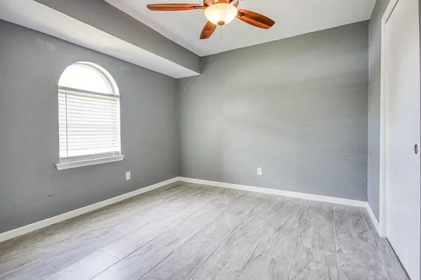 wooden floor in a hall with an entryway