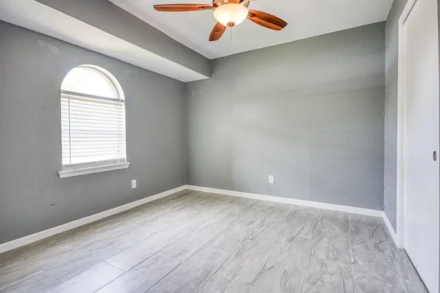 wooden floor in a hall with an entryway