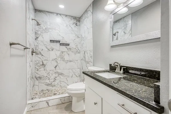 a house view with a garden space