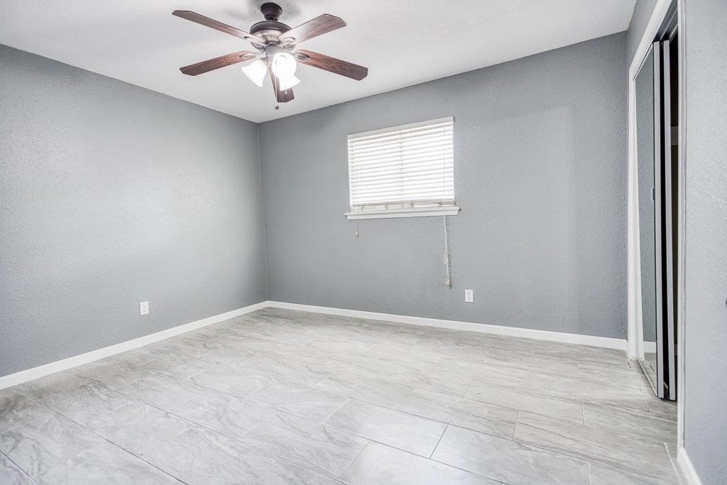 1810 Marlin Street Portland, TX 78374 - Photo 30 of 32 a view of an empty room with a window