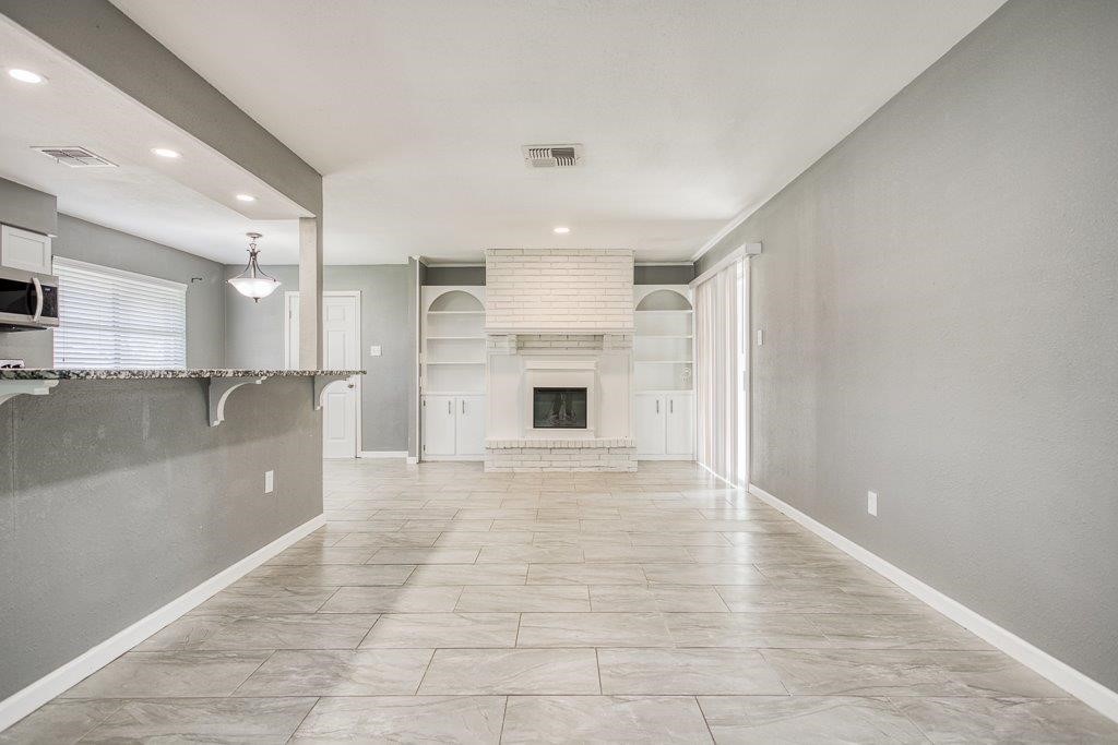 1810 Marlin Street Portland, TX 78374 - Photo 8 of 32 a view of a kitchen with a sink and a large window