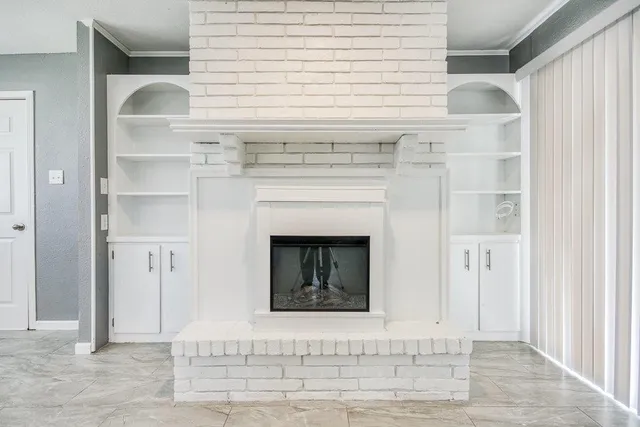 a view of a kitchen with a sink and dishwasher cabinets