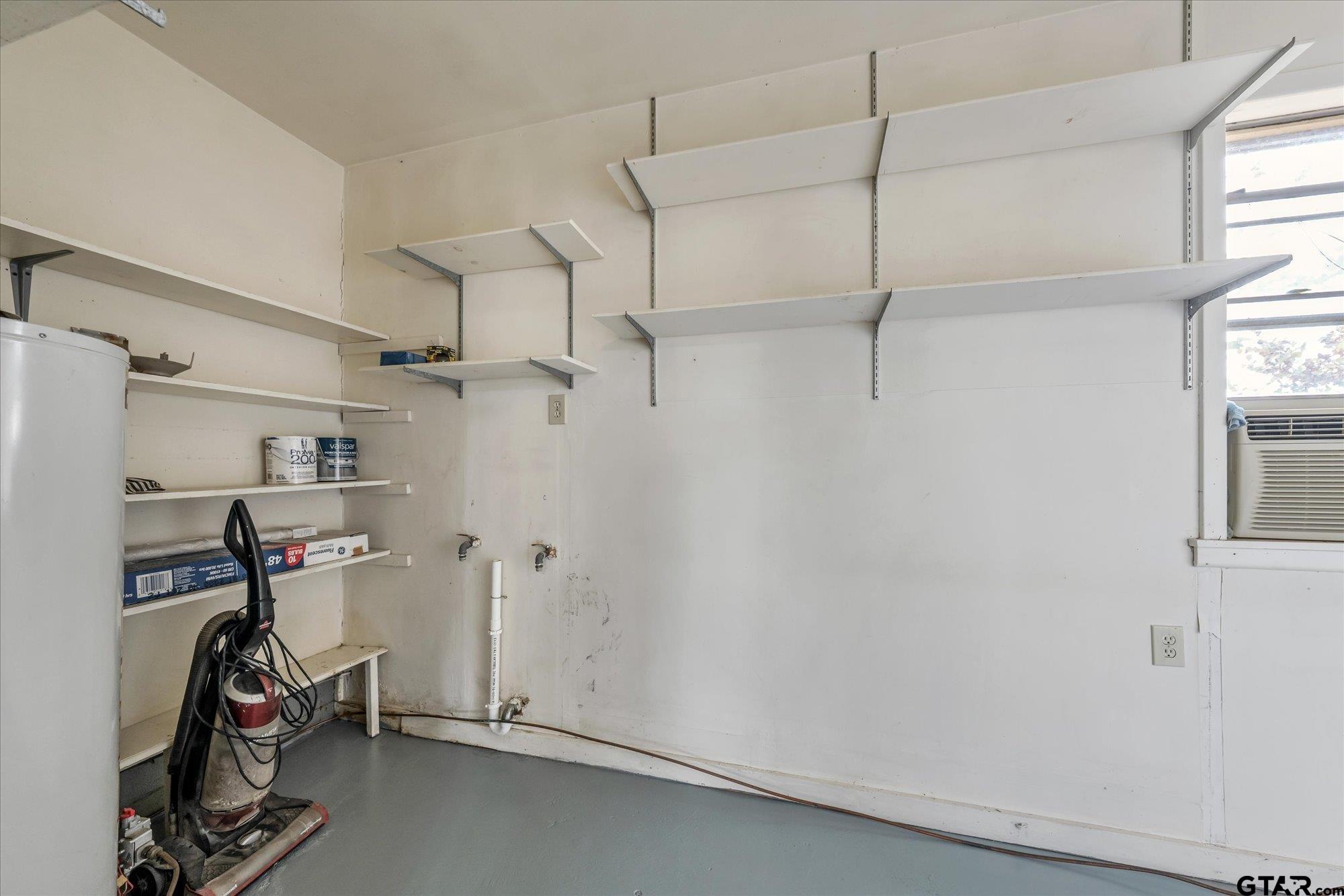 11619 County Road 4331 Larue, TX 75770 - Photo 19 of 30 a view of a storage & utility room with a window