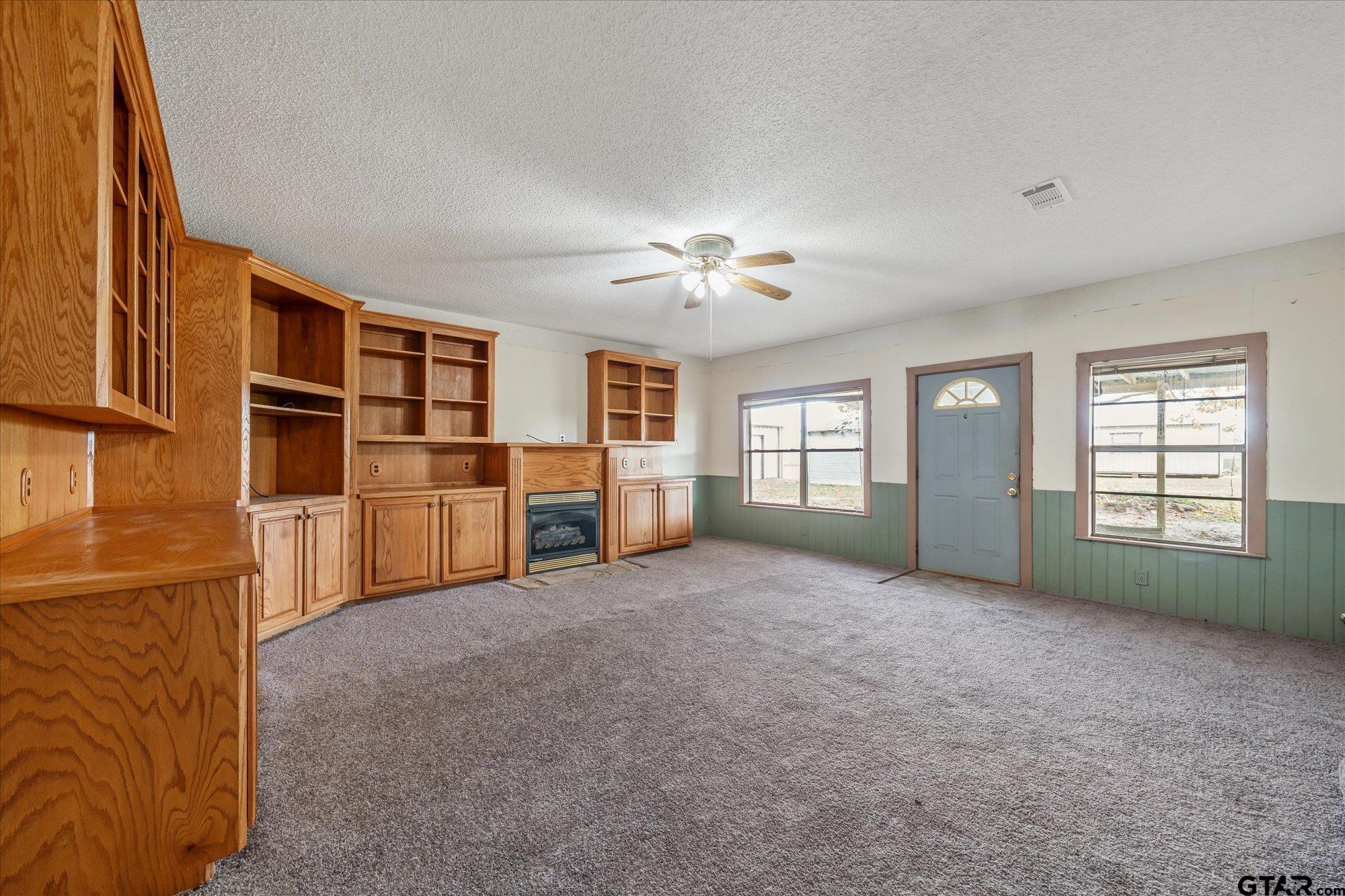 11619 County Road 4331 Larue, TX 75770 - Photo 5 of 30 a view of livingroom with furniture and windows
