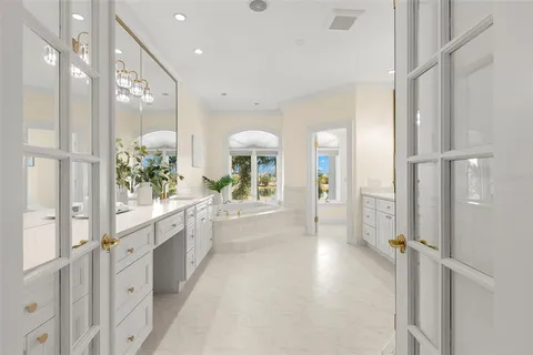 a view of a living room and a floor to ceiling window