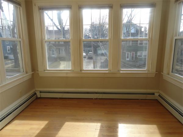 34 Meadow Road, Unit 4 Woonsocket, RI 02895 - Photo 5 of 12 a view of a room that has a window in it