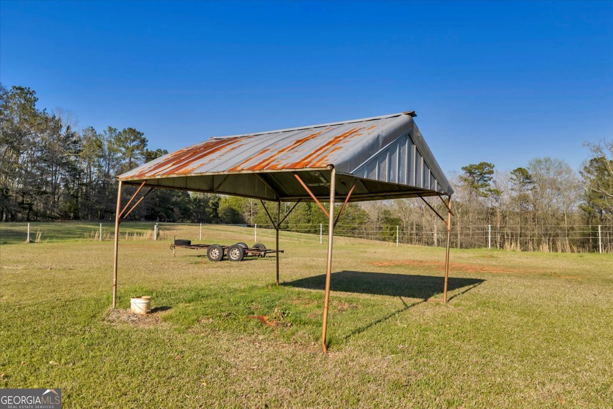 1730 Stallings Road Haddock, GA 31033 - Photo 13 of 28 a view of an outdoor space and swimming pool