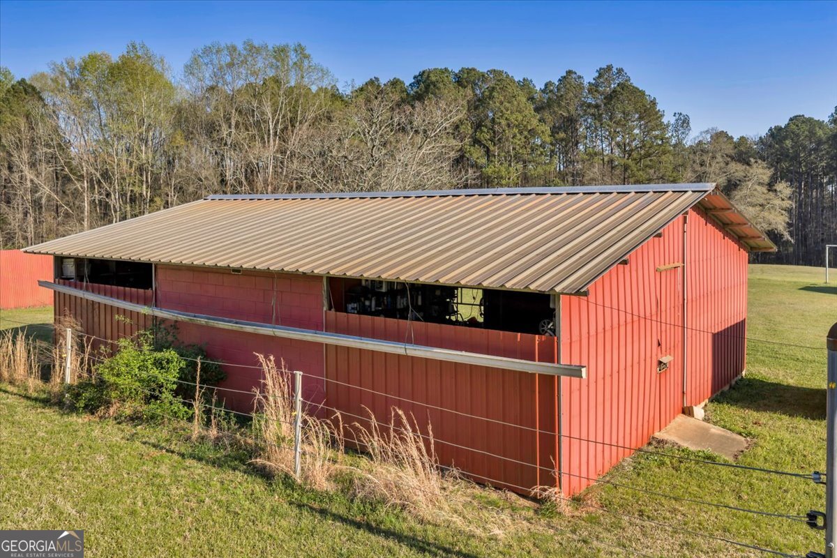 1730 Stallings Road Haddock, GA 31033 - Photo 5 of 28 a view of a house with a yard