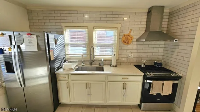 a bathroom with a sink a vanity and a mirror