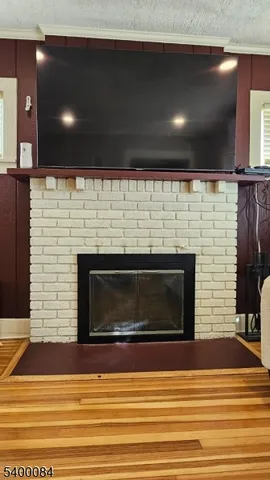 a fireplace with wooden floor