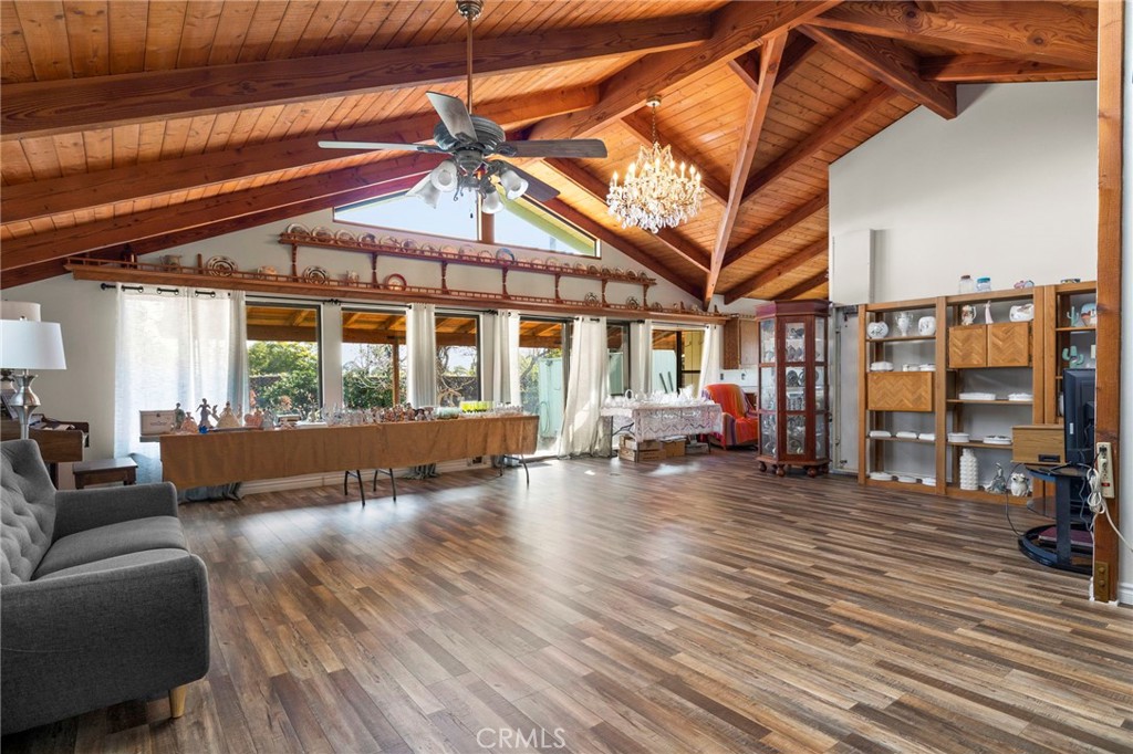 Huge Bonus room with Beautiful wood beamed vaulted ceilings and tons of windows