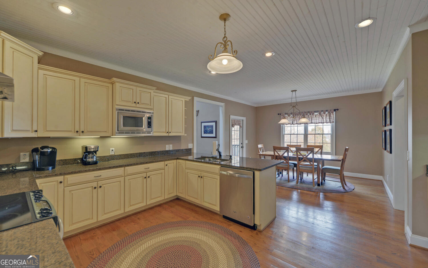 29 Cottage Lane Toccoa, GA 30577 - Photo 14 of 49 a kitchen with stainless steel appliances granite countertop sink stove top oven and cabinets