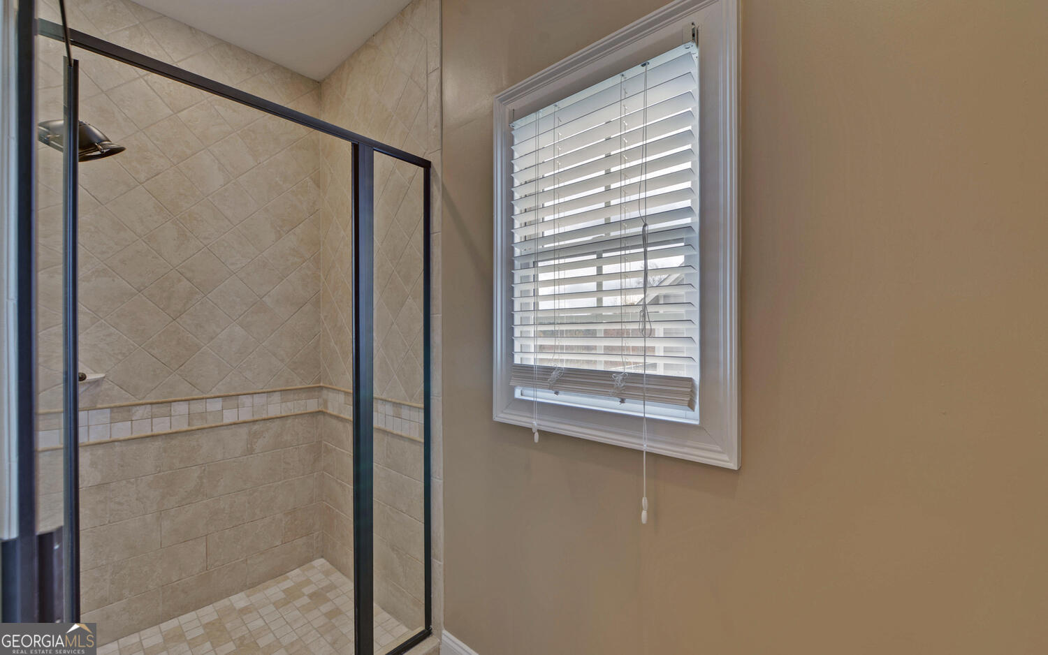 29 Cottage Lane Toccoa, GA 30577 - Photo 19 of 49 a bathroom with a shower and a window