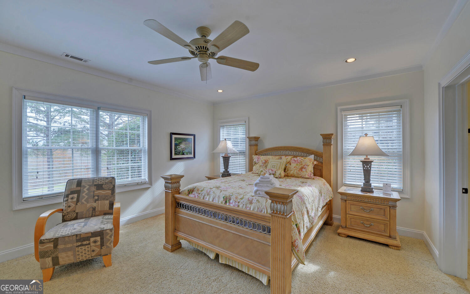 29 Cottage Lane Toccoa, GA 30577 - Photo 33 of 49 a bedroom with a bed and a chandelier
