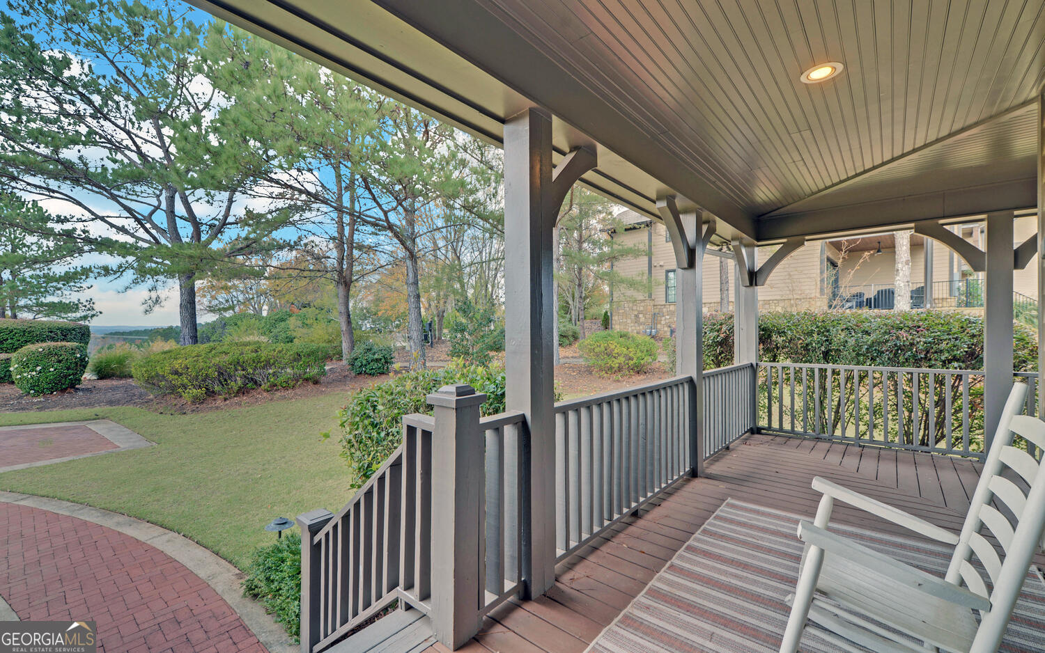 29 Cottage Lane Toccoa, GA 30577 - Photo 4 of 49 a view of a porch with wooden floor and fence
