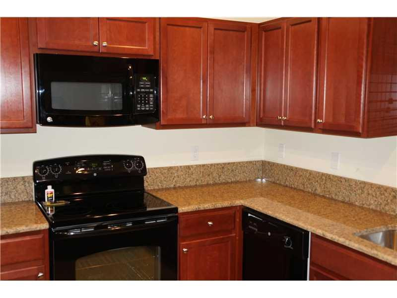 15212 Southwest 119th Terrace, Unit 15212 Miami, FL 33196 - Photo 2 of 10 Kitchen