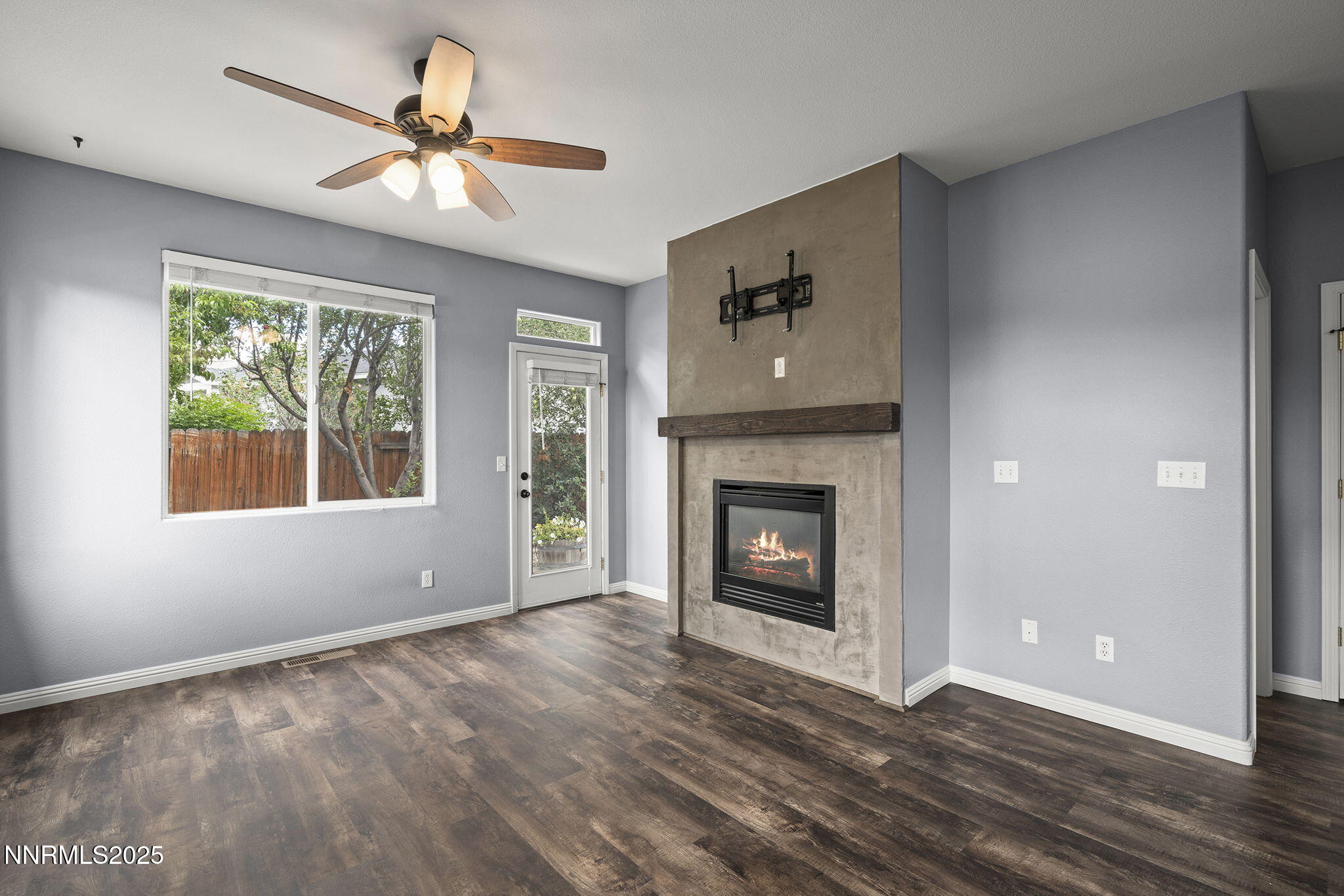 5897 September Circle Reno, NV 89523 - Photo 14 of 24 a view of an empty room with a window and fireplace