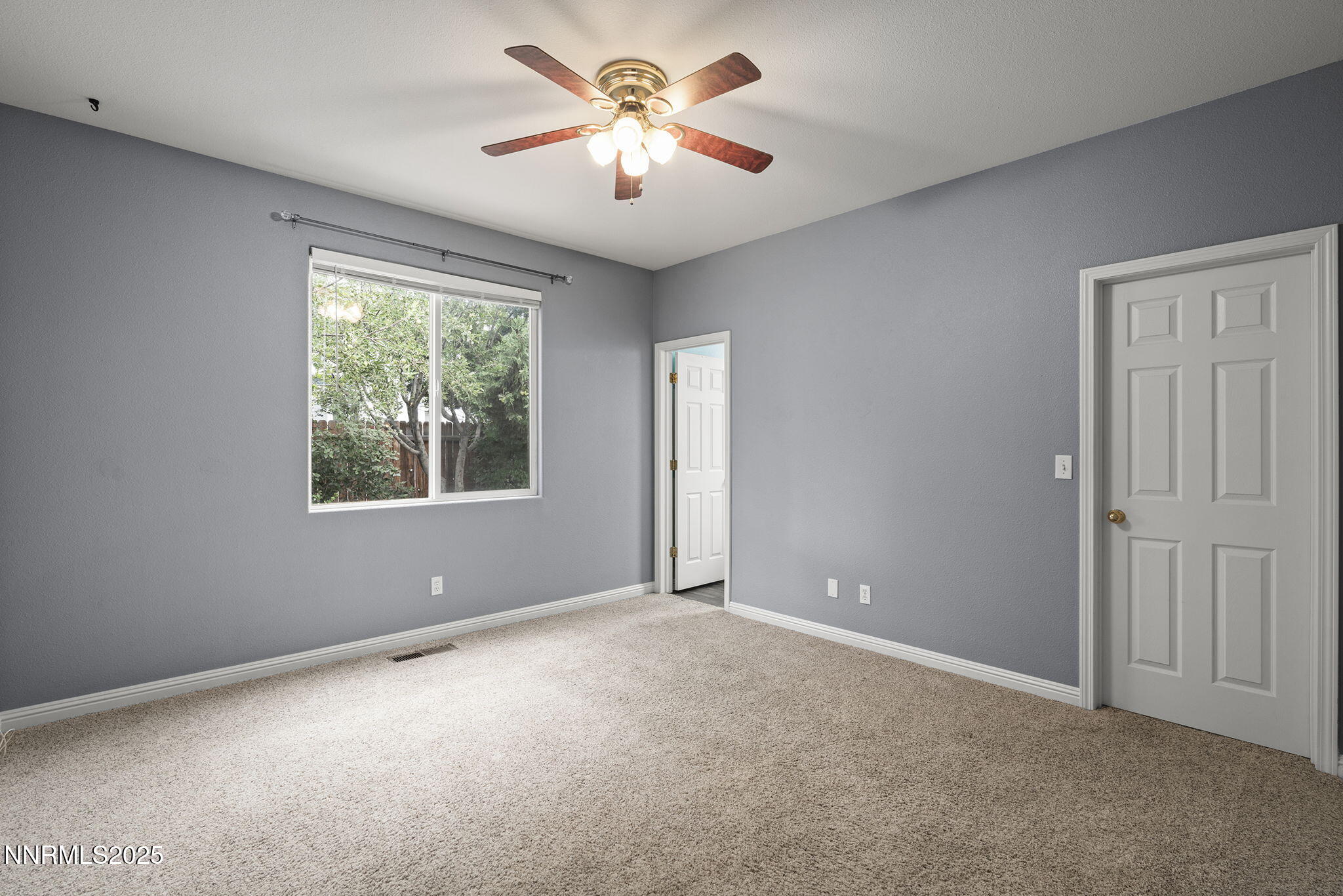 5897 September Circle Reno, NV 89523 - Photo 16 of 24 a view of an empty room with a window
