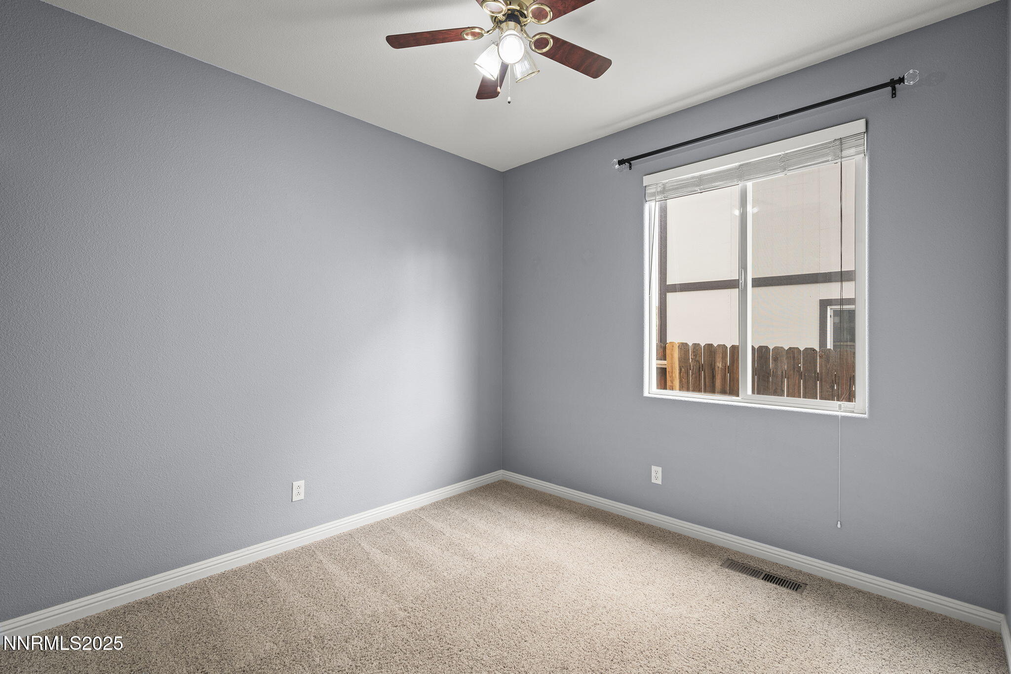 5897 September Circle Reno, NV 89523 - Photo 19 of 24 a view of an empty room with a window