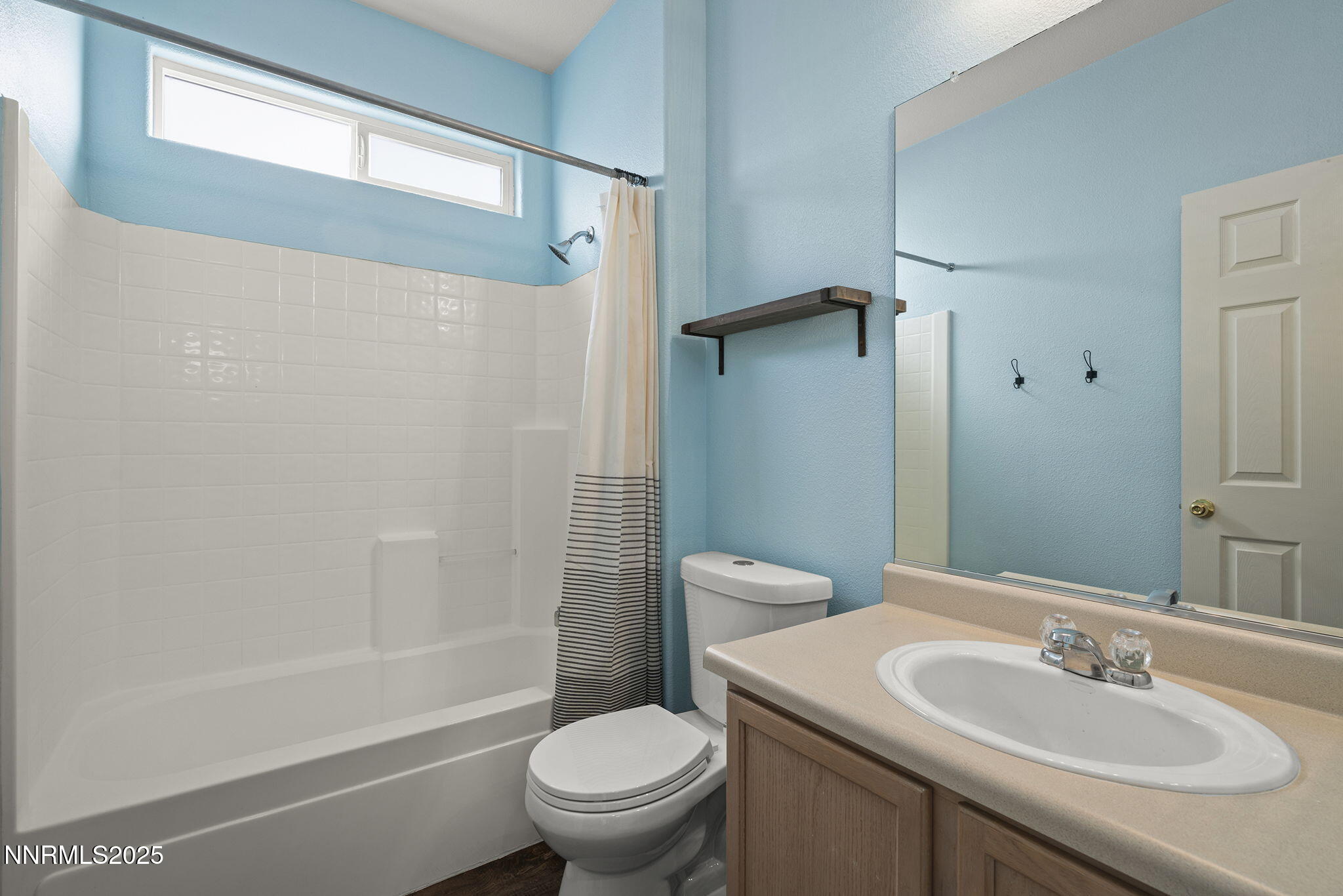 5897 September Circle Reno, NV 89523 - Photo 20 of 24 a bathroom with a sink toilet and shower